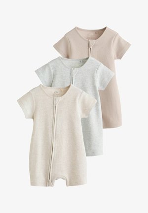 Tres peleles de bebé de manga corta y tejido de canalé en beige, gris claro y rosa pálido, cada uno con cierre de cremallera frontal.