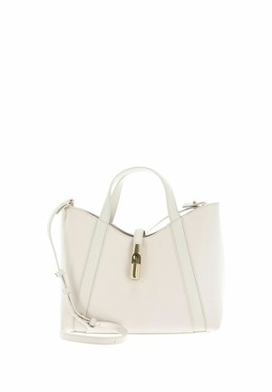 Cream-colored leather handbag with two handles, an adjustable shoulder strap, and a central gold-colored lock detail.