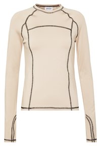 Beige lange mouw top met zwarte stikdetails. Heeft een ronde halslijn en een sportieve fit, gemaakt van een gladde, rekbare stof.