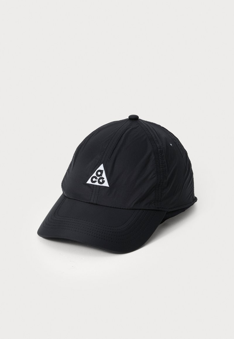 Black cap made of lightweight, textured fabric. Features a curved brim and a white logo in a triangular shape on the front.