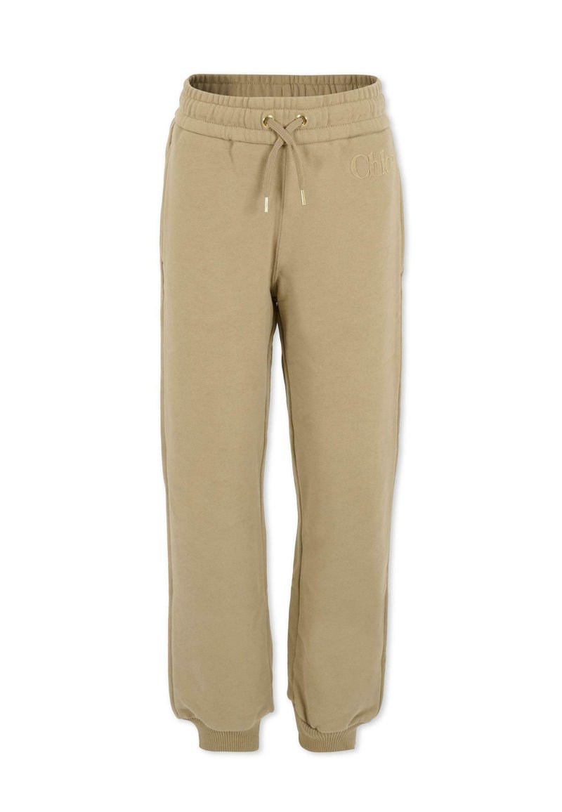 Beige sweatpants met een trekkoord in de taille, ribgebreide boorden, zijzakken en logodetail. Zachte stof met een gladde textuur.