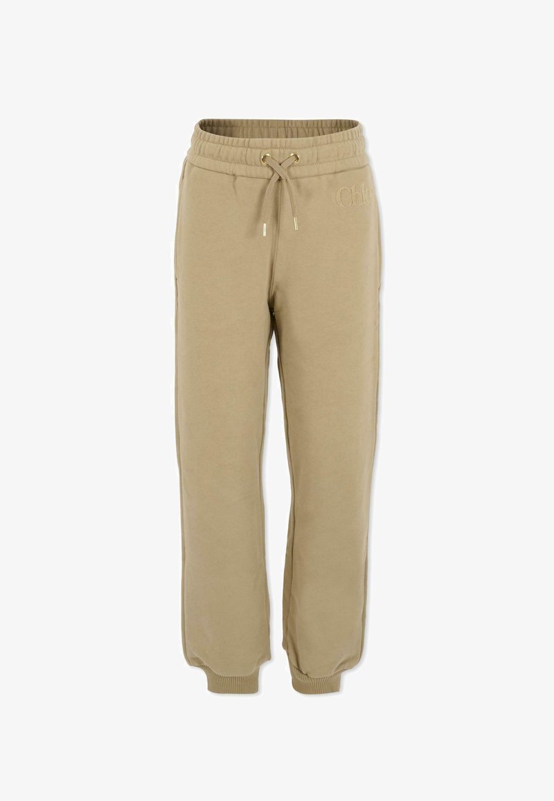 Beige sweatpants met een trekkoord in de taille, ribgebreide boorden, zijzakken en logodetail. Zachte stof met een gladde textuur.