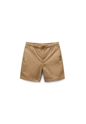 Shorts beiges avec un devant plat, fermeture par bouton et taille élastique. Confectionnés en tissu léger avec poches latérales et ourlet cousu.