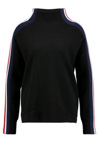 Musta collegepaita korkealla kauluksella, jossa on tummansinisiä, valkoisia ja punaisia raitakoristeita hihojen varrella. Resorit helmassa ja hihansuuissa. Pehmeä tekstuuri.