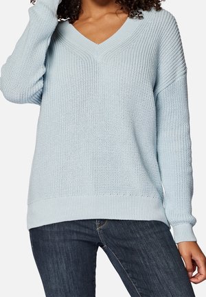 Stickad tröja - light blue
