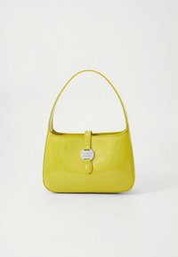 Glossy lime green handbag with single strap and round silver clasp engraved with brand name, set against a plain white background.
