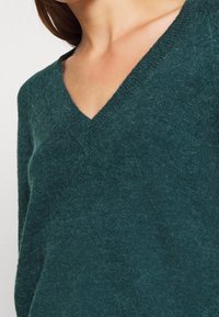 mbyM Svetr - teal