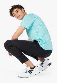 Spyder Pantalones deportivos - black