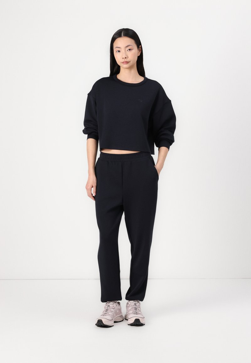 Roxy RISE VIBE PANTS Tracksuit bottoms black Zalando