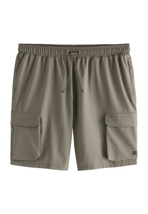 Cargo shorts in light olive green, featuring an elastic waistband with drawstring, two side pockets, and textured fabric.