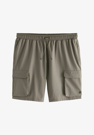 Kargo šortsevi u svijetlo maslinastoj boji, s rastezljivim pojasom i vezicom, dva bočna džepa i teksturiranom tkaninom.