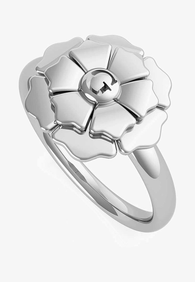 Bague en argent avec un design en forme de fleur comportant des pétales superposés et une bande lisse et polie.