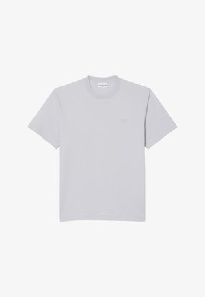 Plain light grey short-sleeve crew neck T-shirt with a small subtle logo on the left chest and a branded label inside the collar.