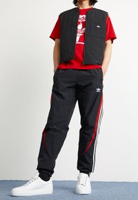 adidas Originals Träningsbyxor - black