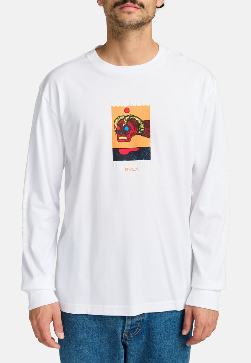 Long-sleeve white cotton t-shirt featuring a colorful graphic of a skull with horns, accentuated by text and design elements.
