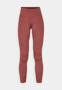 Leggings rouges chinés avec une taille haute. Fabriqués en tissu extensible et texturé. Leur design ajusté s'étend jusqu'à la cheville.