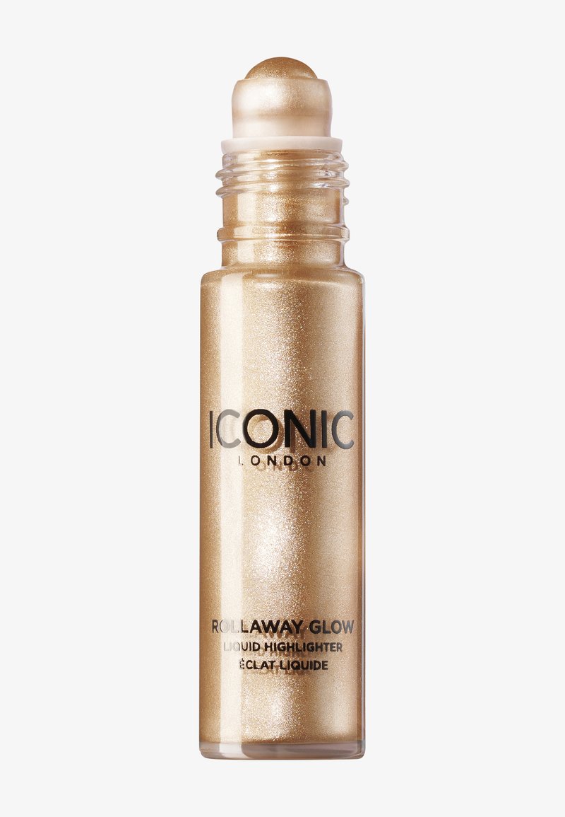 Gylden flytende highlighter i en klar glass rollerball-flaske. Har en metallisk finish med fin gylden glitring. Etiketten inkluderer merkenavnet.