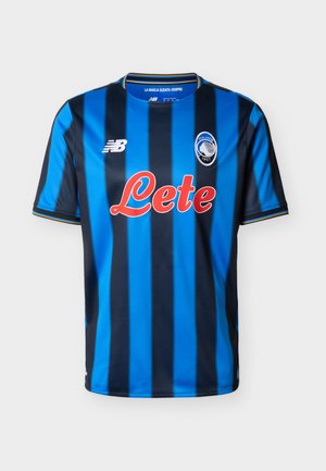Blue and black striped soccer jersey with a crew neck, featuring the New Balance logo and "Leté" in red across the chest, and team crest.