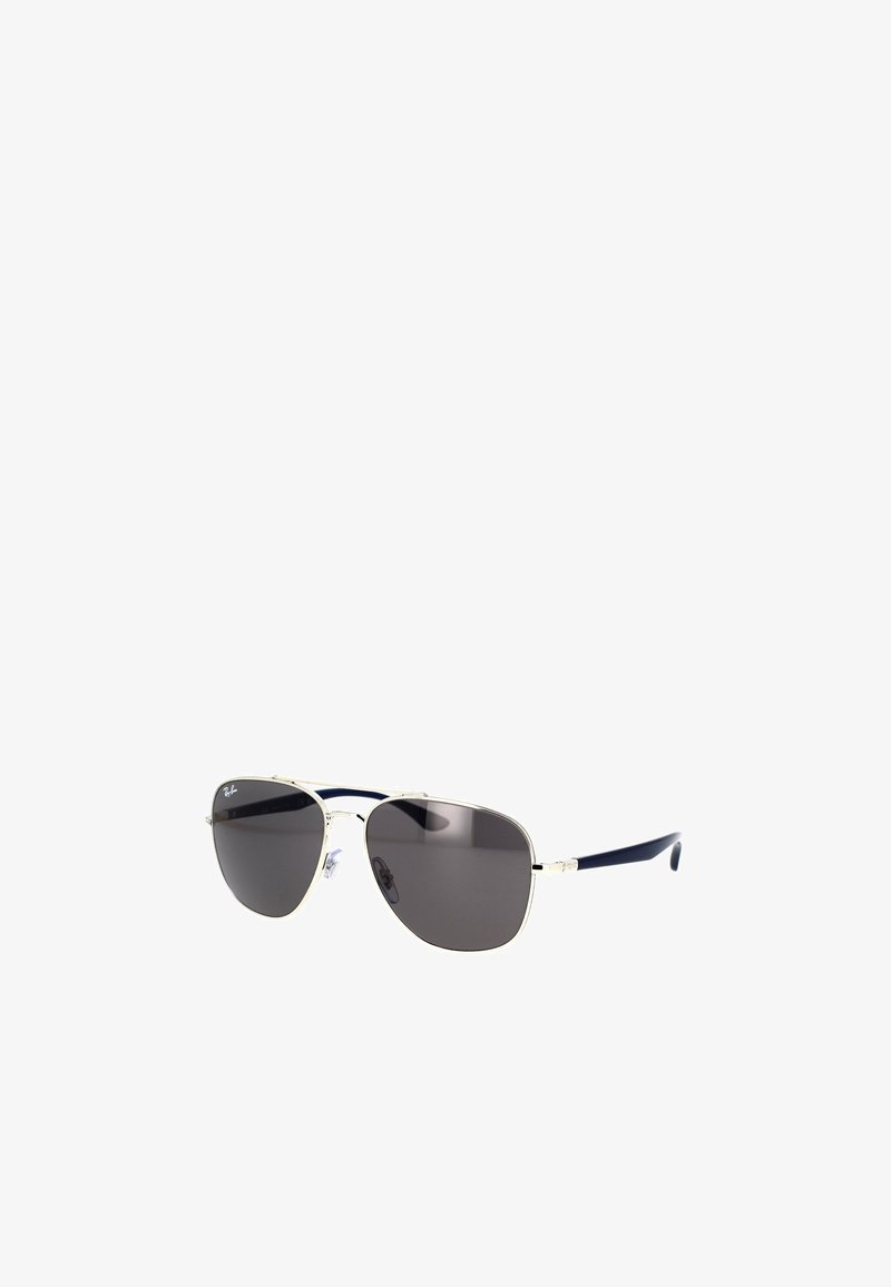 Occhiali da sole stile aviator con lenti scure, montatura in metallo argento e stanghette in plastica blu navy. Naselli regolabili per il comfort.