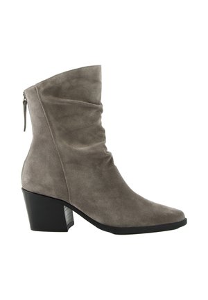 Mid-height suede ankle boot in taupe with a rounded toe, back zipper, and block heel in black.