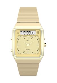 Montre en quartz dorée avec un cadran carré, affichage numérique, cadran jaune, accents argentés et un bracelet en métal doré texturé.