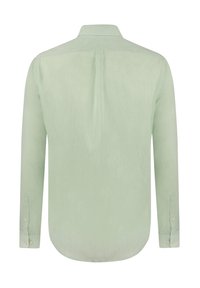 Chemise à manches longues en vert menthe clair, fabriquée à partir d'un tissu texturé. Présente un col classique et des poignets boutonnés avec un ourlet arrondi.