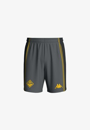 Pantaloncini sportivi grigi con strisce gialle ai lati e due loghi gialli vicino agli orli, uno con una fleur-de-lis e l’altro con due figure sedute.