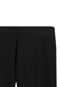 Zwarte sportleggings van een gladde, rekbare stof, met een hoge tailleband en een strak, minimalistisch ontwerp zonder zichtbare patronen.