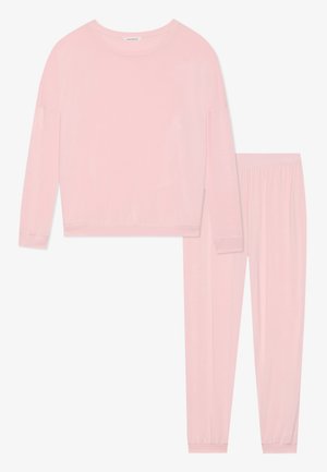 Light pink loungewear set featuring a long-sleeve top with a round neckline and relaxed fit, paired with matching elastic waistband pants.