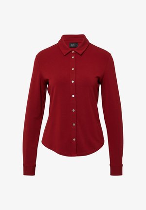 Red long-sleeve button-up shirt made from soft fabric, featuring a classic collar and silver buttons along the front placket.