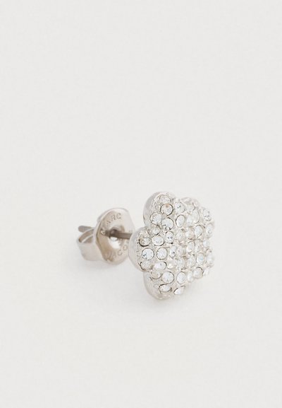 Strieborné náušnice v tvare kvetu zdobené viacerými priehľadnými kryštálmi, s bezpečným zapínaním na hrebienok. Hladký metalický povrch.