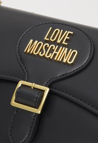 Love Moschino BUCKLE CROSSBODY - Mala a tiracolo - nero