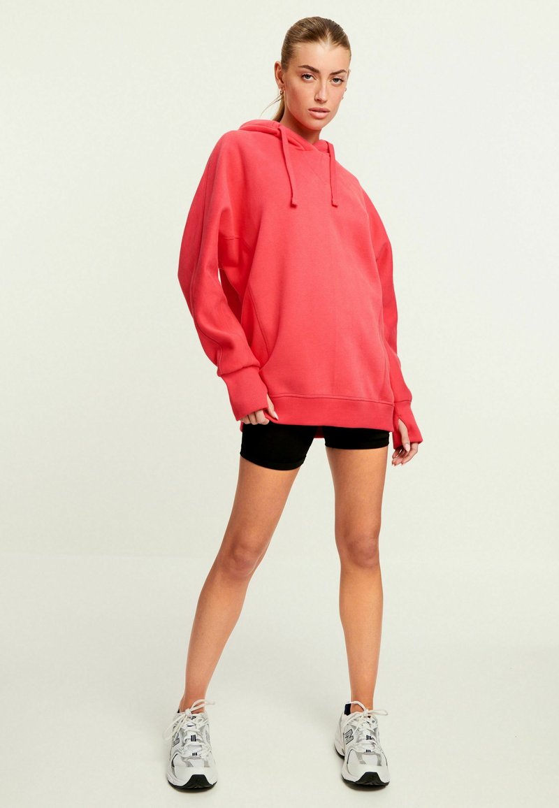 Next Huppari - fluro pink