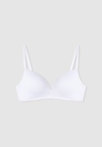 Bralette wireless bianca con coppe lisce e sagomate, spalline sottili e regolabili, e un design senza cuciture. Il tessuto sembra morbido ed elasticizzato.