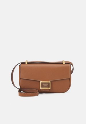 Brown leather crossbody bag with gold buckle and adjustable strap, rectangular shape, smooth texture, and visible stitching details.