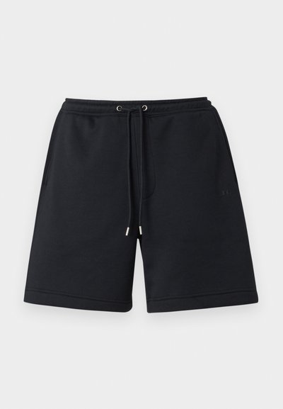 Shorts de sport noirs en mélange de coton doux. Dotés d'une taille élastique avec cordon de serrage et embouts métalliques. Design simple, sans motifs.