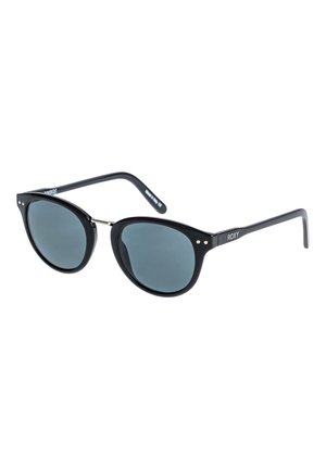 Gafas de sol de plástico negro con forma ovalada de gato y lentes grises polarizados. Presenta acentos de hardware en plateado y el logo de la marca en la patilla.