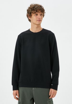 - Sweter