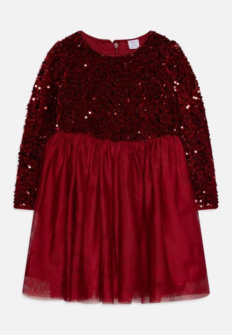 Robe rouge à manches longues pour fille avec haut en velours à sequins et jupe en tulle froncée, fermeture éclair au dos, posée à plat sur fond blanc.