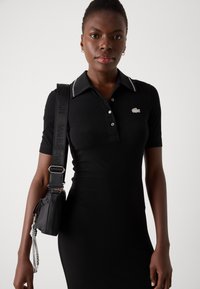 Lacoste Dzsörzéruha - black