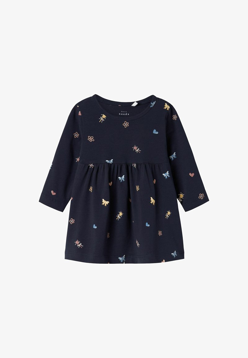 Vestido de marina hecho de una tela suave con mangas largas. Presenta una cintura fruncida y estampados de flores y corazones multicolores.