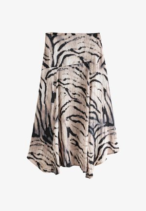 Asümmeetriline beež seelik musta tiigri triibuga mustriga ja tekstuurse kangaga.