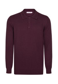 Burgundowa koszula polo z długim rękawem, wykonana z mieszanki bawełny. Posiada kołnierzyk, zapięcie na trzy guziki oraz ściągacze przy rękawach i u dołu.