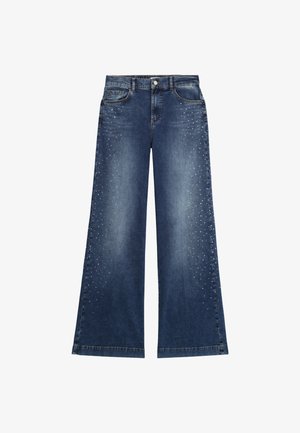 Weite Jeans in dunkelblauem Denim, mit einem gesteppten Design auf der Vorderseite, vier Taschen und einem Knopfverschluss. Strukturierte Oberfläche mit minimaler Verblassung.