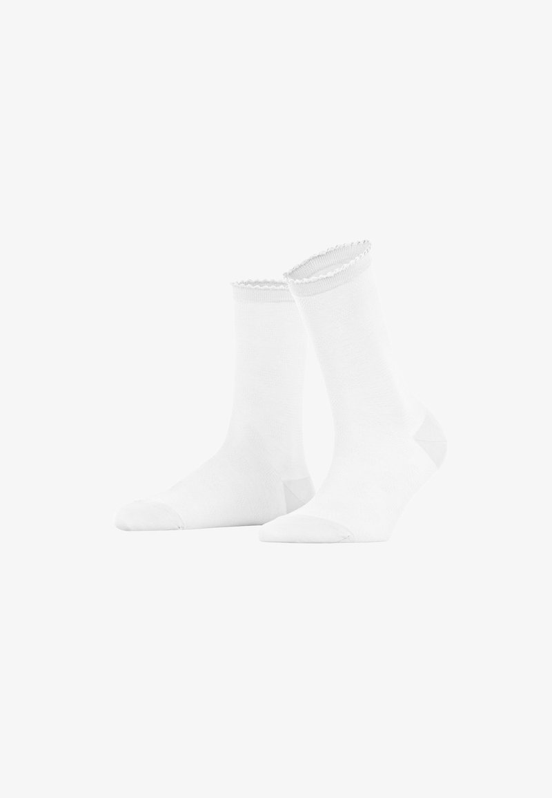 White ankle socks made from soft cotton blend, featuring a wavy, scalloped edge at the top and reinforced toe and heel sections.
