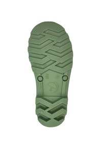 Semelle de chaussure en caoutchouc vert avec motif de crantage en zigzag, logo circulaire et talon plat. Comprend des marquages de taille et des icônes de drainage. Surface texturée.