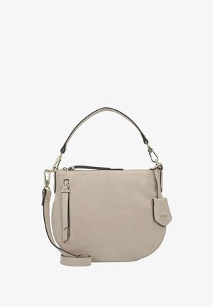 Beige suede crossbody bag with a rounded shape, contrasting black trim, zippered top, and a front pocket with a flap. Adjustable strap included.