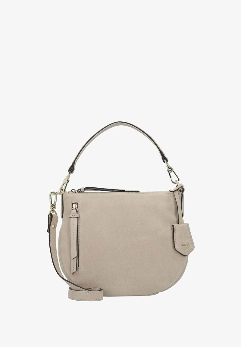 Bolso bandolera de ante beige con forma redondeada, ribete negro en contraste, parte superior con cremallera y un bolsillo frontal con solapa. Incluye una correa ajustable.