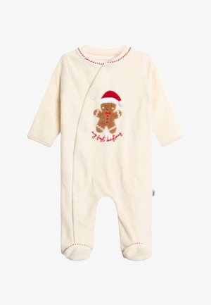 Rompertje voor baby's in roomkleur met lange mouwen, voetjes, rode stiksels en een peperkoekmannetje met een kerstmanmuts en de tekst "my first Christmas".