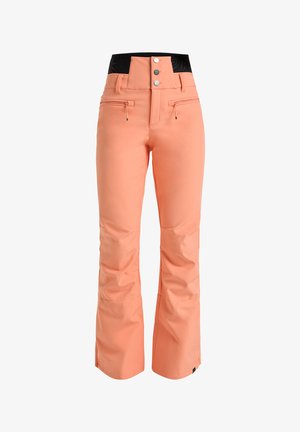 Pfirsichfarbene Skihose mit hoher schwarzer Taillenbund, Front-Reißverschlusstaschen und weitem Bein. Glattes, wasserdichtes Material mit leicht strukturierter Oberfläche.